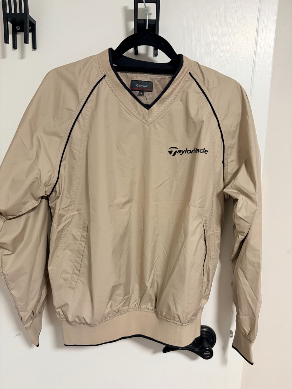 TaylorMade Beige V-Neck Windbreaker with Black Trim